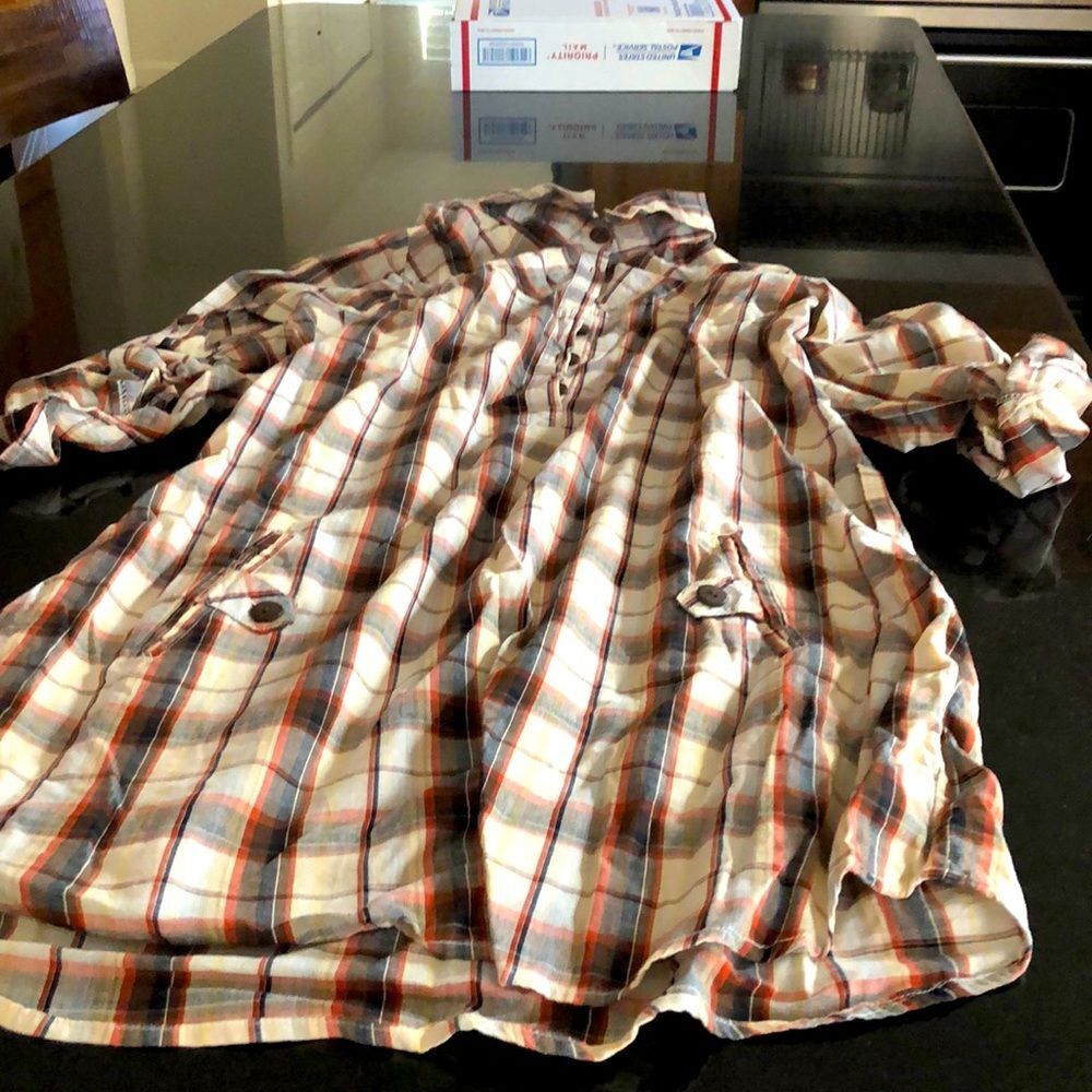 Lovenotes dress size L brown family with red. Sleeves go from 3/4 sleeve…